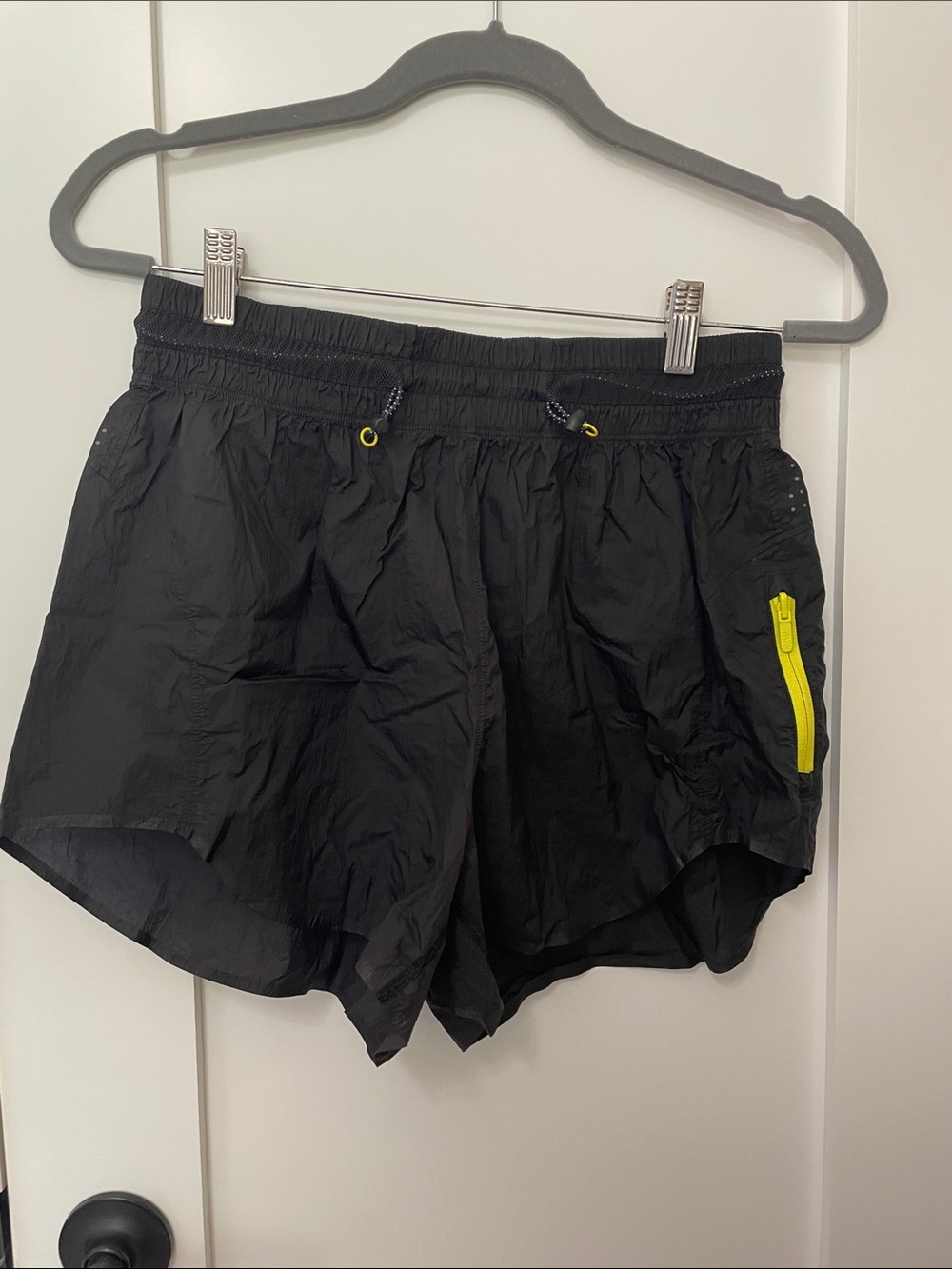 lululemon athletica Black Athletic Shorts with Yellow Zipper Detail